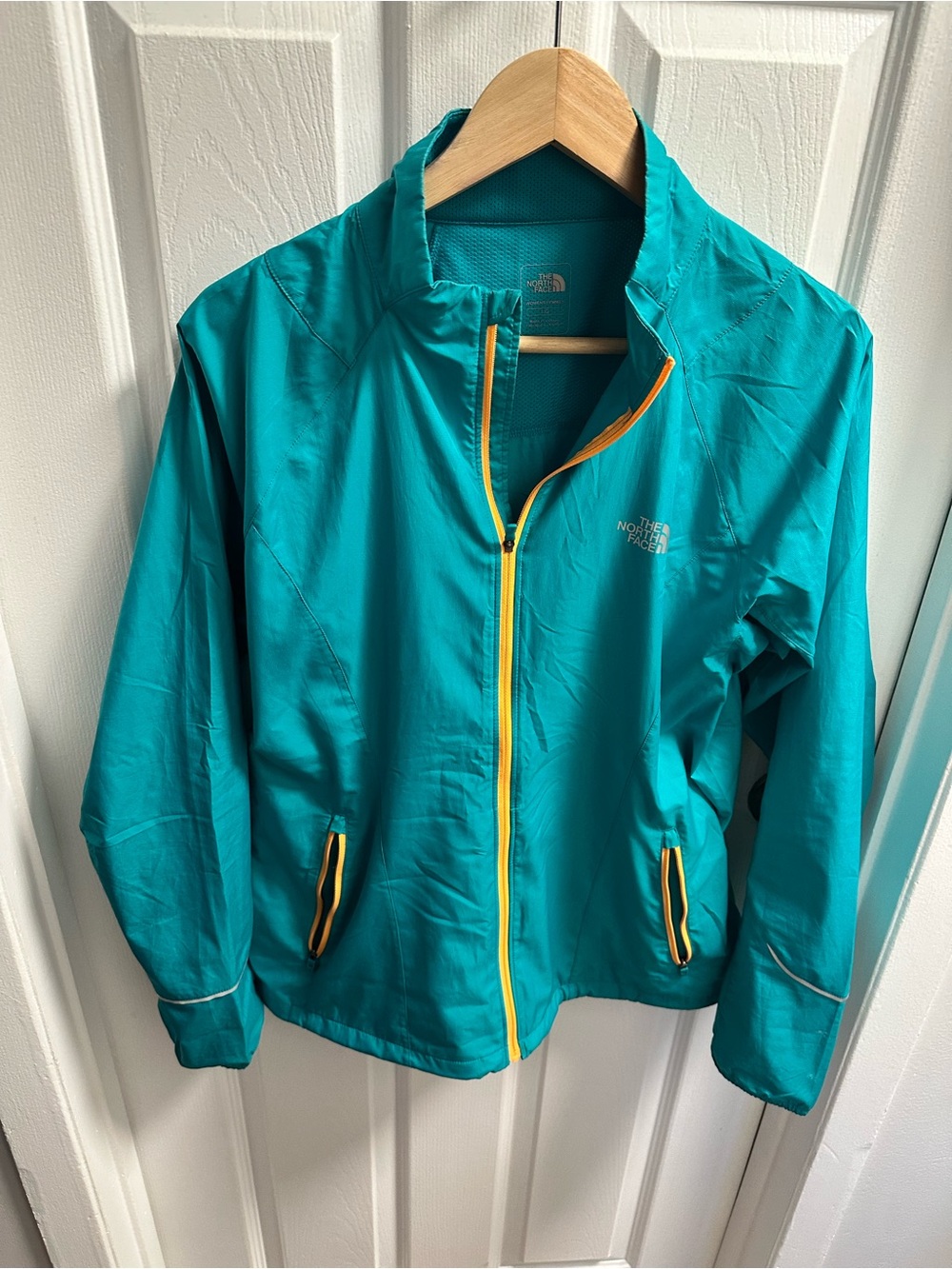 The North Face Teal Jacket with Yellow Trim